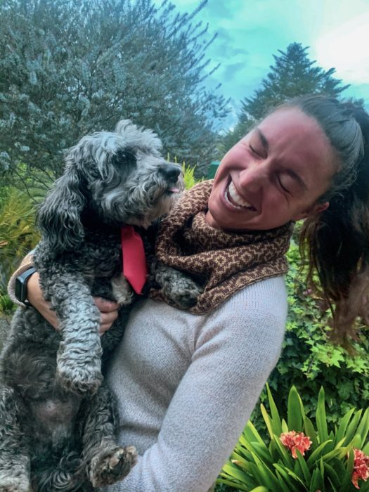 woman, smiling, dog, sky, trees, clouds, house sitting etiquette