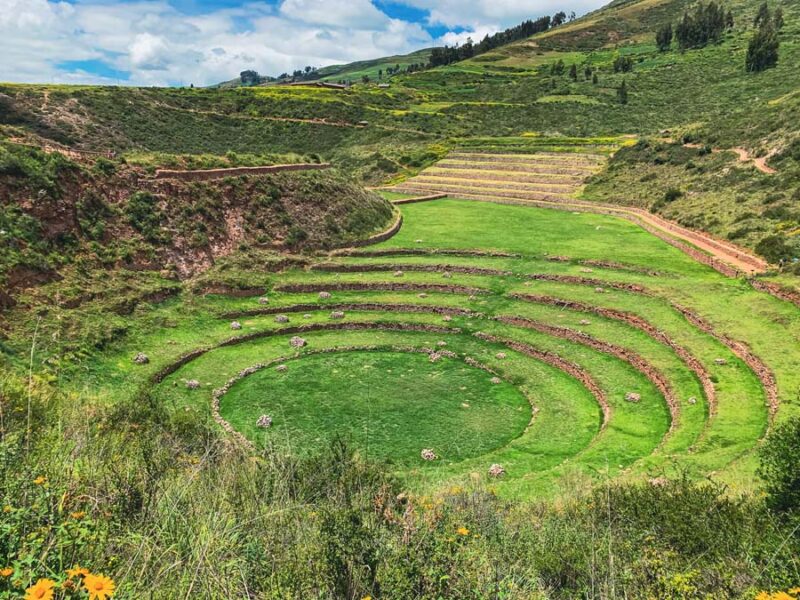Moray Archaeological Park, Cusco Tourist Ticket Circuit III, Inca terraces, Inca ruins, mountains, clouds, sky, dirt, grass, rocks, stones, thing to do in the Sacred Valley Peru, Hike Maras to Moray