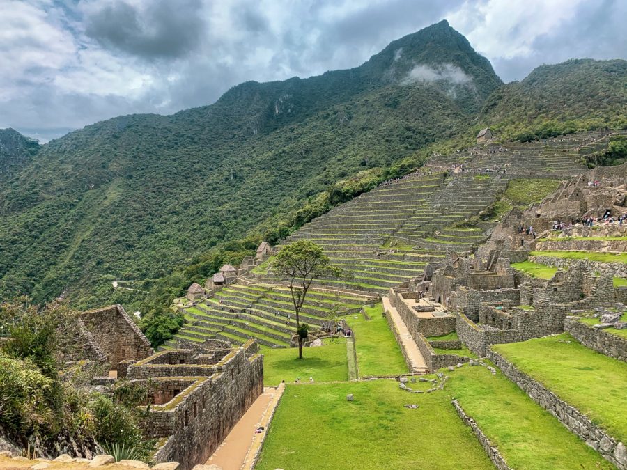 Visiting Machu Picchu Independently, Machu Picchu, Inca ruins, mountains, trees, terraces, stones, pathways, clouds, sky
