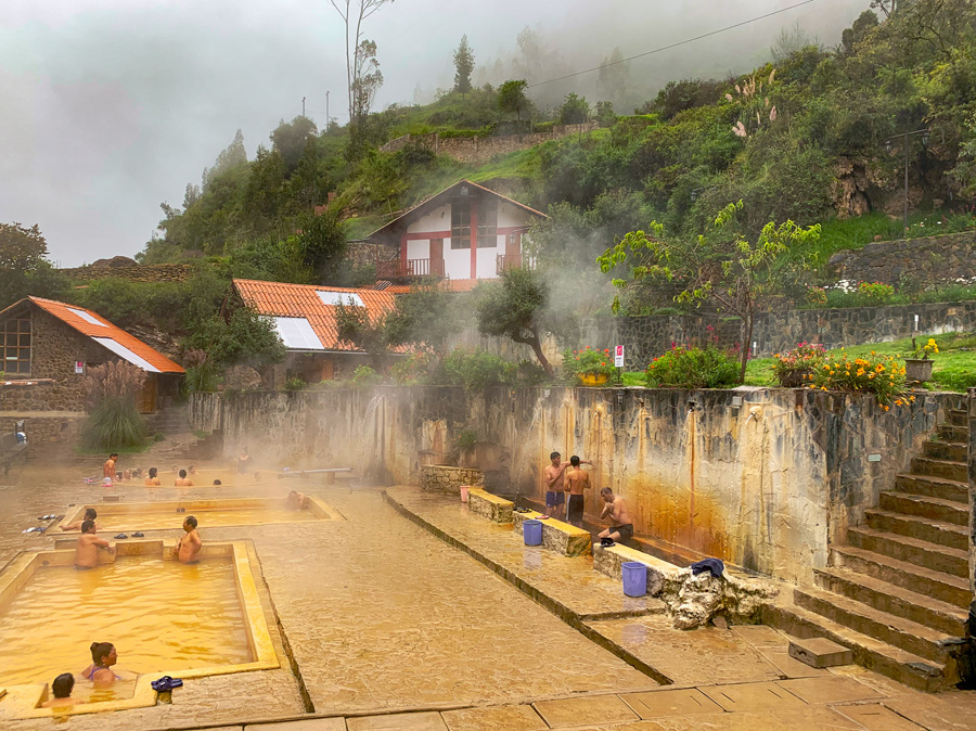 Lares Hot Springs, people, pools, thermal pools, baños, public baths, fog, building, mountains, Peru hot springs, Lares Valley