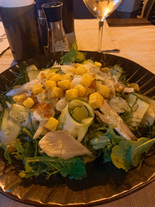 Pasaj, best places to eat in Sibiu, Sibiu food guide, salad, plate, table cloth, trout, croutons, wine glass, salt and pepper shaker
