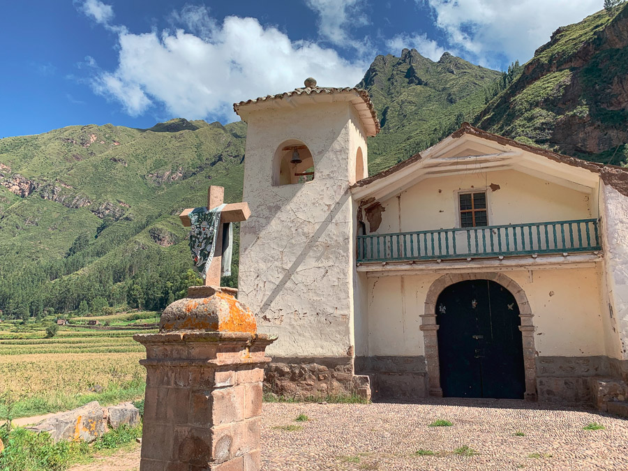 Pisac church, things to do in Pisac, Peru's Sacred Valley, church, corn fields, mountains, clouds, sky, cross, the Sacred Valley in Peru