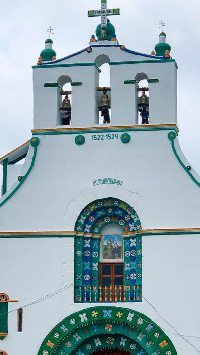 San Juan Chamula, church, bells, men ringing church bells of San Juan Chamula, sky, Indigenous villages of Mexico, traditional villages of Mexico