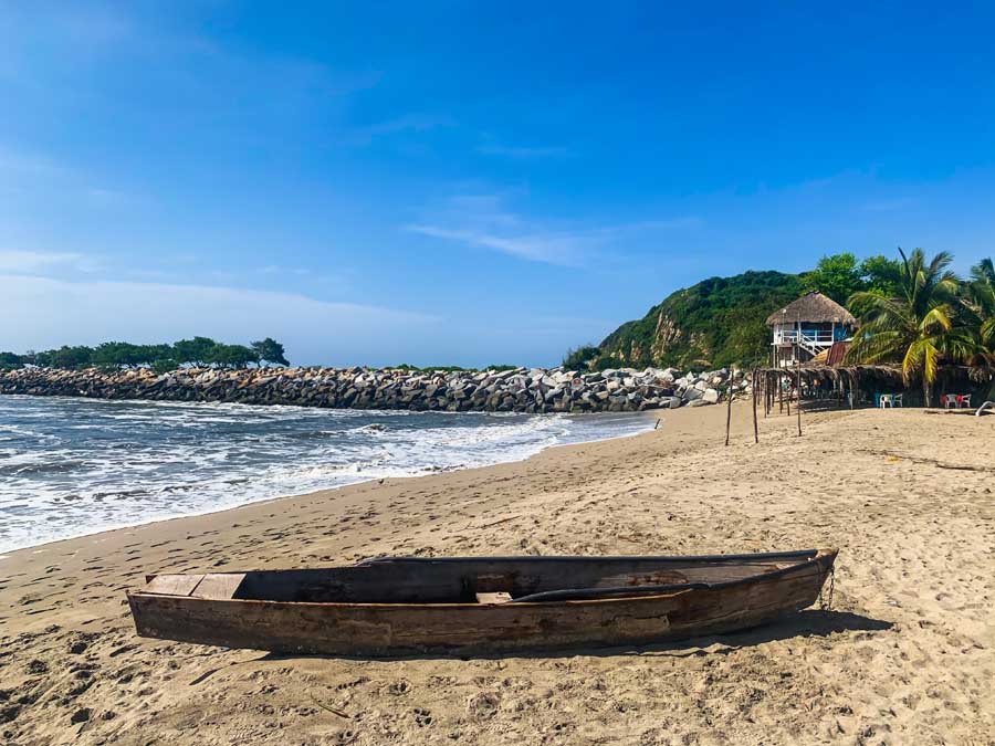 best Oaxaca beach towns, Chacahua, Chacahua Playa, boat, sky, building, Oaxaca coast, Oaxaca beaches, best beaches in Mexico