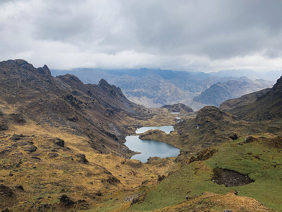 Huilquijasa Pass, lake, alpine lake, grass, mountains, stones, grass, clouds, Lares trek, one day trek to Lares Peru