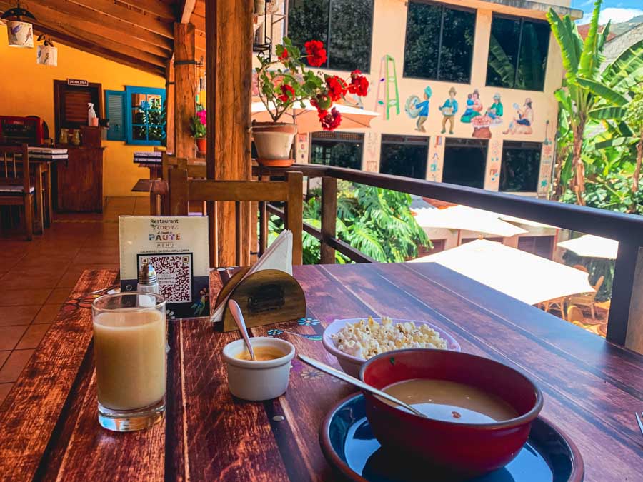 restaurant corvel, paute, day trips from Cuenca ecuador, garden patio, plate, soup, drink