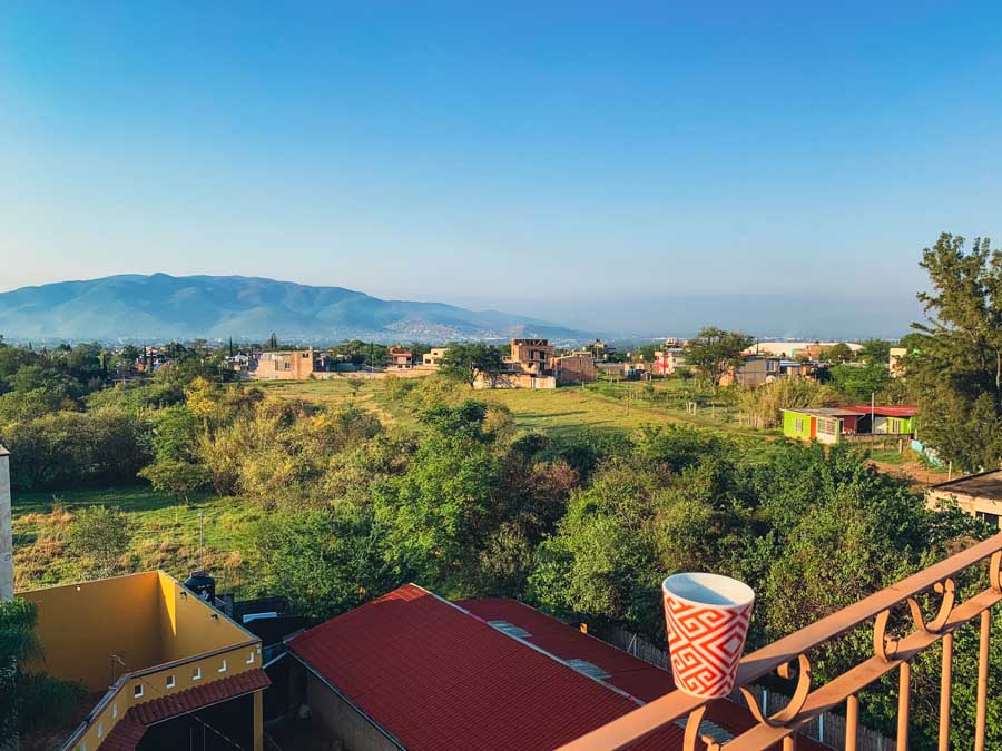 best places to stay in oaxaca, casa montana oaxaca, coffee mug, mountain view, rooftop view, best places to visit in oaxaca