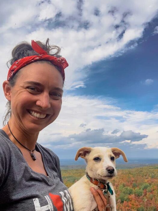 St peters Dome wisconsin, places to see fall foliage in wisconsin, woman, puppy, changing leaves, sky, clouds