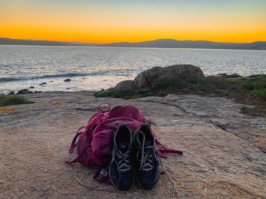 My backpack and shoes at the End of the World in Muxia