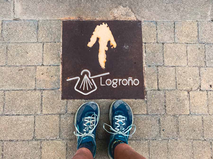 my trail runners next to the Logrono signboard