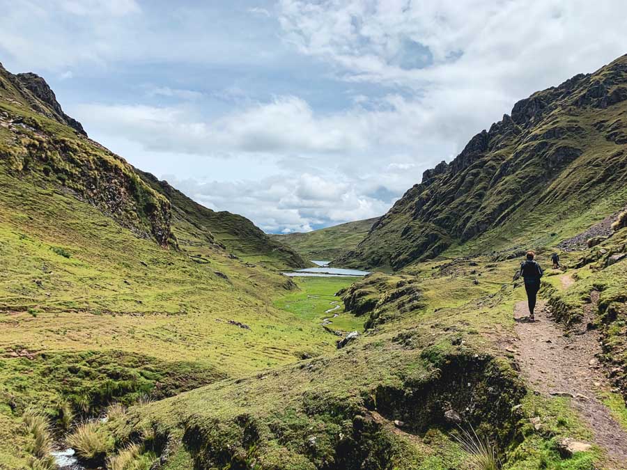 Hikers enjoying the casual hike around Kinsacocha lake near Pisac Peru